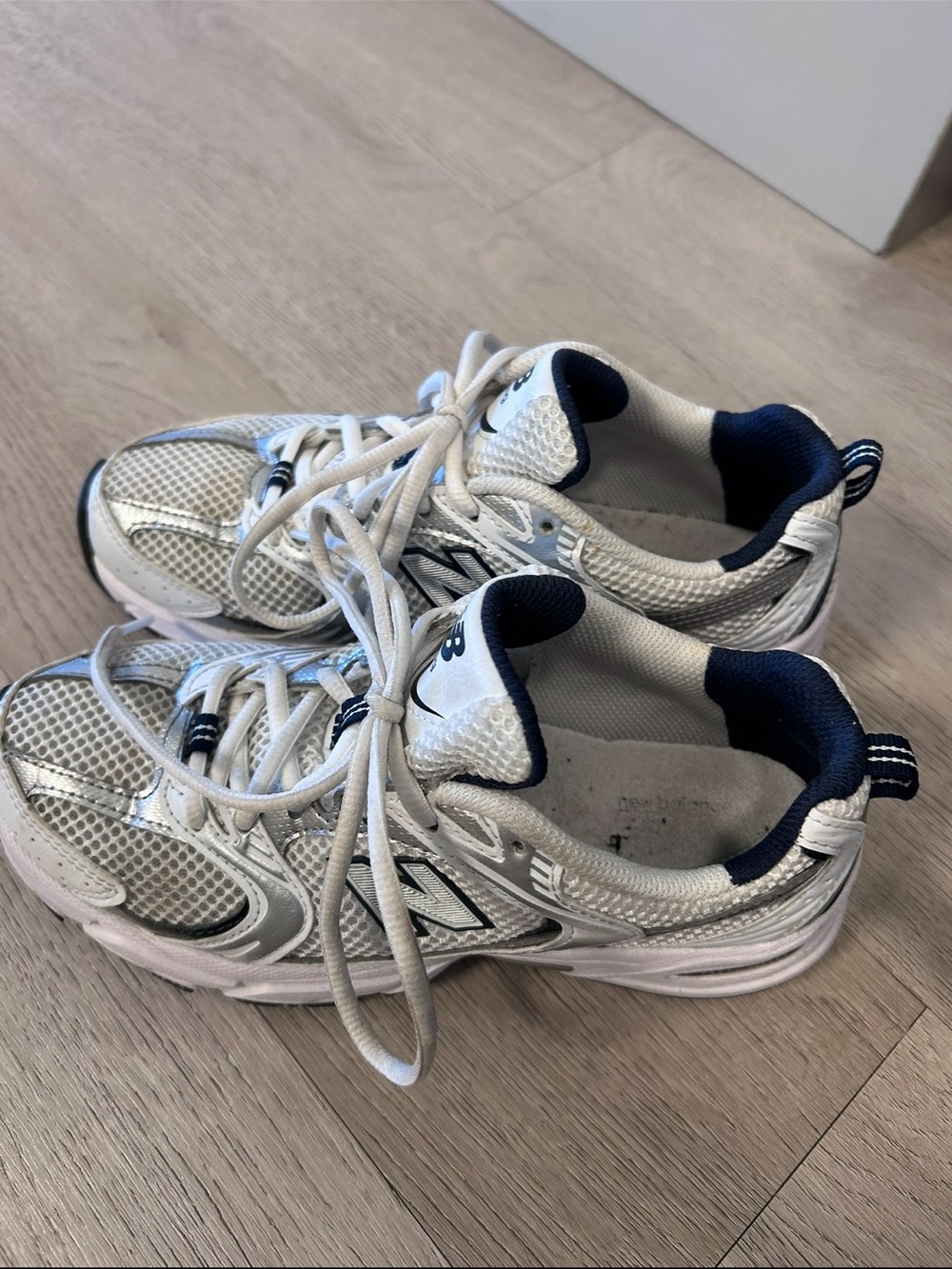 New Balance Woman’s 530 White & Navy Athletic Sneakers